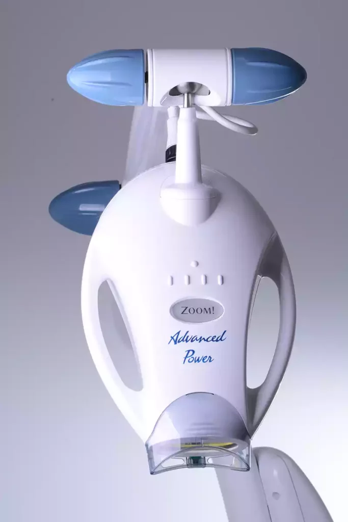A cosmetic dentistry device with a blue light.