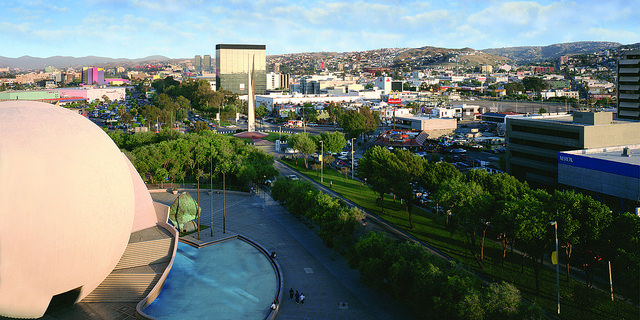Why do Americans go to the dentist in Tijuana? 8 Aerial view, city.
