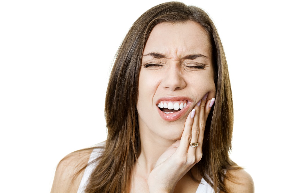 Woman, toothache, root canal treatment.