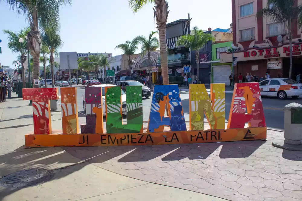 A colorful sign advertising Tijuana dental work.